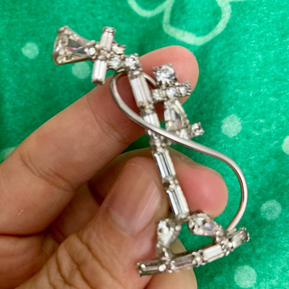 Such a find! This jewelry  an antique style telephone pin made in the 1950s